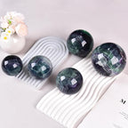 JIC Gem Natural Colorful Fluorite Crystal Sphere with Wooden Stand,Decorative Crystal Ball Fluorite Gemstone Sphere for Meditation,Feng Shui,Witch-Style Decor,Table 80-90mm