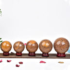 JIC Gem Real Natural Large Crystal Sphere Ball with Wooden Stand for Fengshui Golden Jade Healing Crystal Ball Decoation Meditation Energy Reiki Ball (100-110mm), 4-4.5inch