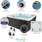 Scenic Outdoor Hot Tub, 6-Person 69-Jet Lounger 4-Pump Spa with Triple Water Columns and Bluetooth Stereo by Essential Hot Tubs
