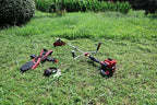 2-Stroke Gas Brush Cutter Pro-Grade String Trimmer EPA Compliant Orange Heavy-Duty Weed Eater Lawn & Overgrowth Clearing Tool